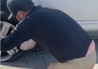Luke Bryan Stops To Change A Tire